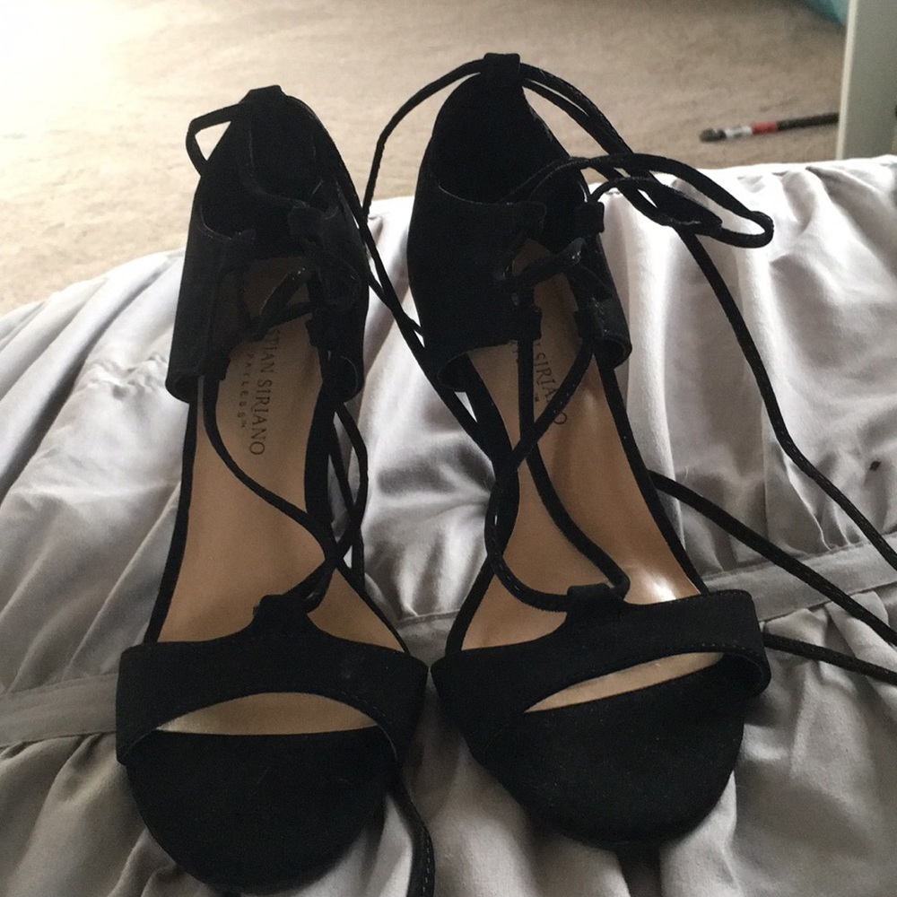 Black heels with straps that tie up leg